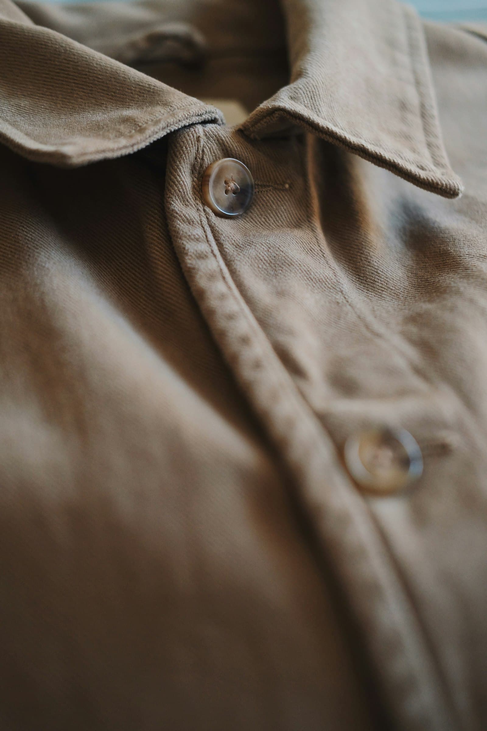 Brown button up collared shirt
